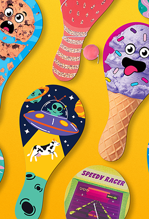 A featured image of paddle ball toy designs on a yellow background